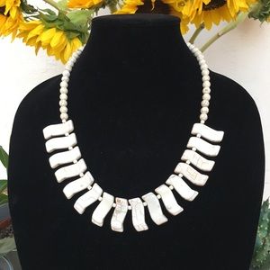 White handmade necklace.